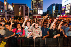 Crowd of music fans in Yonge-Dundas Square.